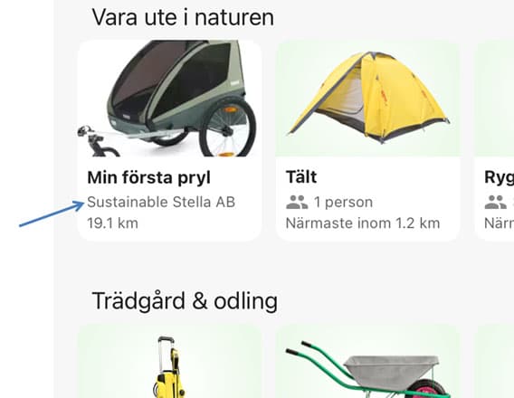 En pil pekar på ett företagsnamn i en app